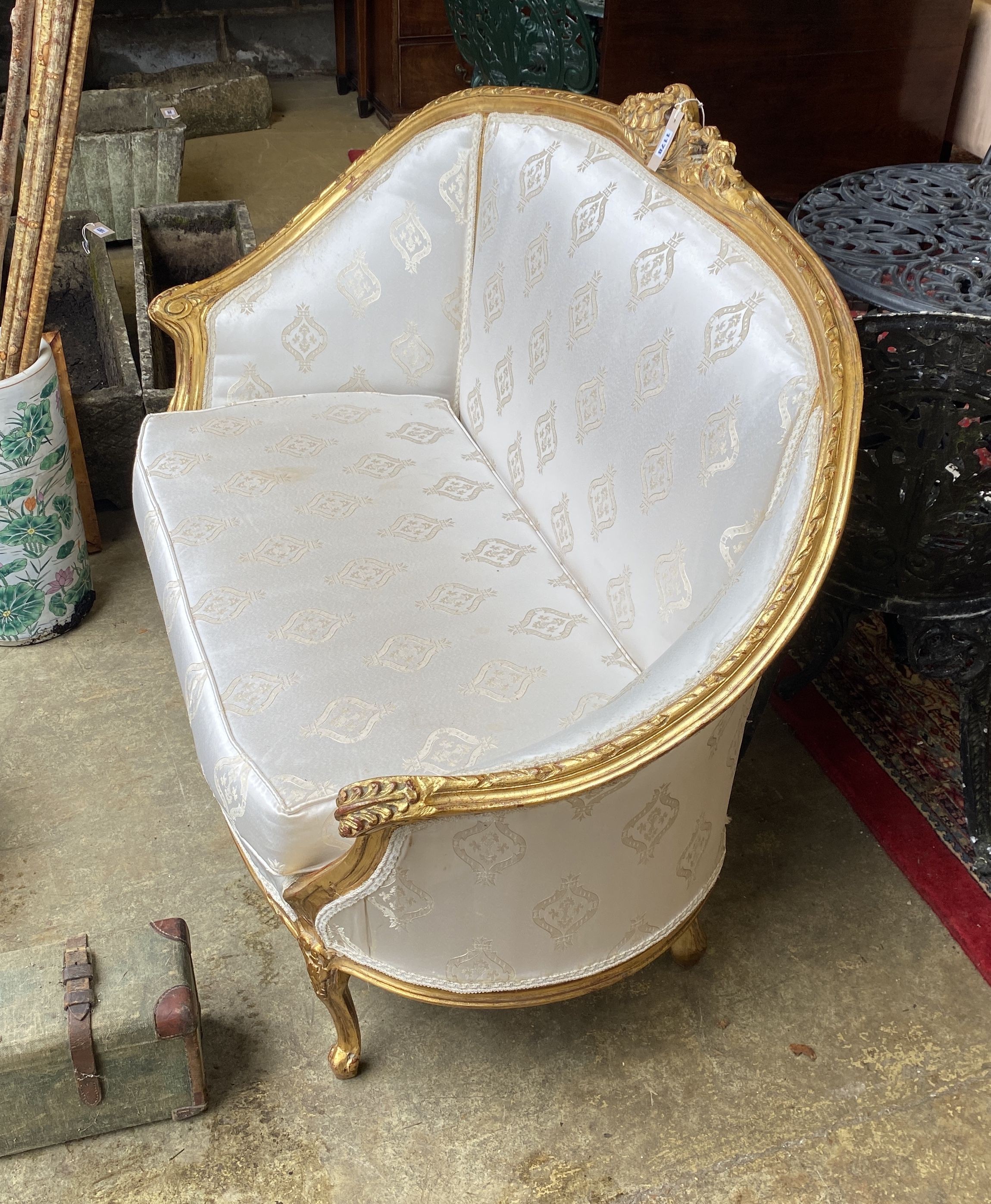 A Louis XVI style carved giltwood canape, width 126cm, depth 50cm, height 96cm